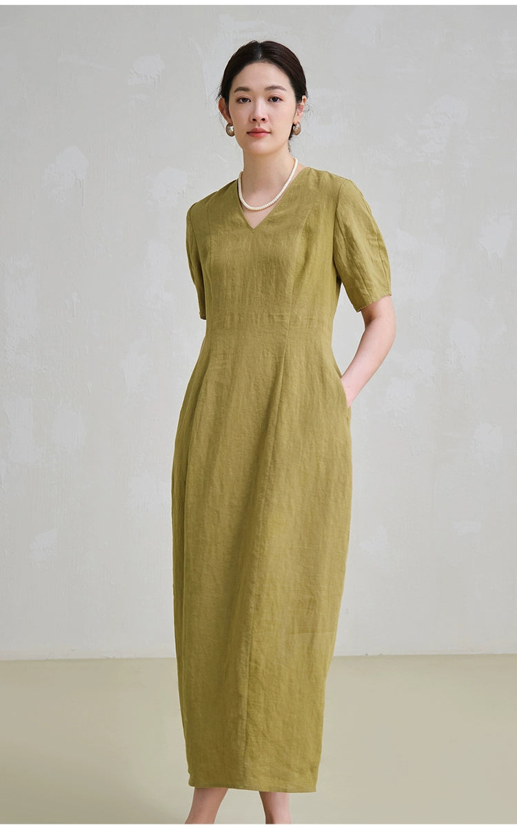 Back slit and hidden zipper detail on linen midi dress