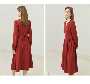 White linen cap sleeve dress styled with-handbag and flats