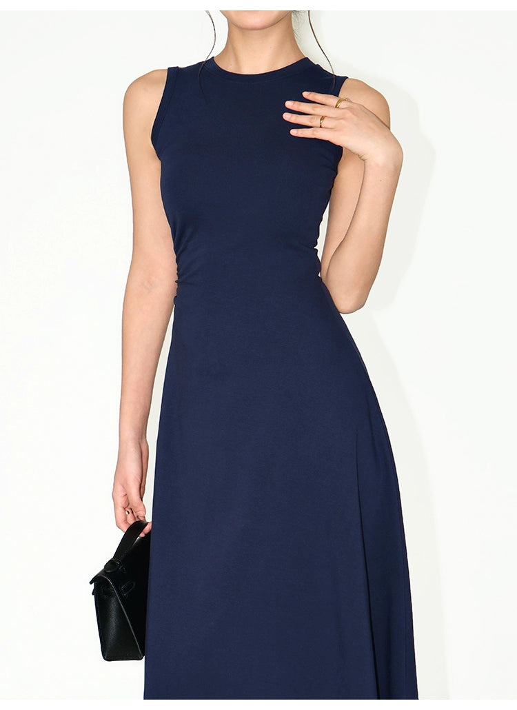 Minimalist black dress with sculpting waistline