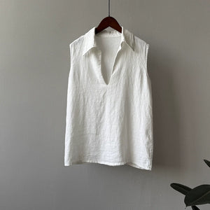 Tailored ivory midi skirt and sleeveless collared top
