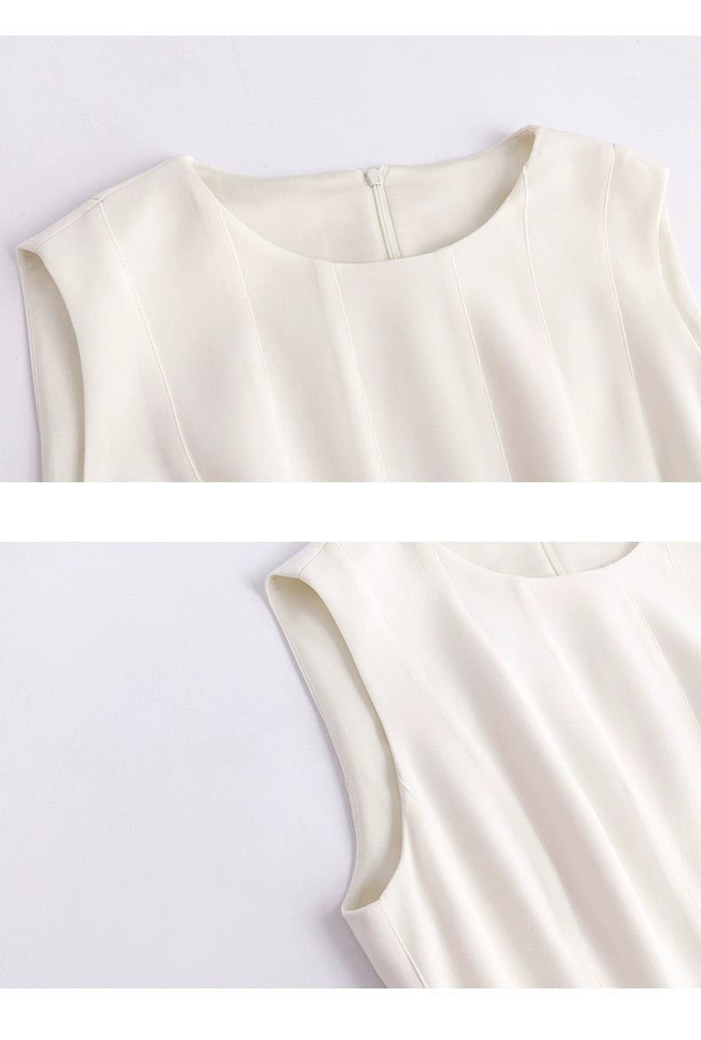 Front view of ivory sleeveless pleated mini dress