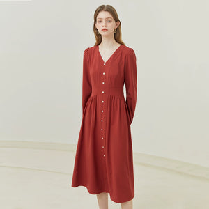 Rear view of navy linen midi with back slit and tailored shape