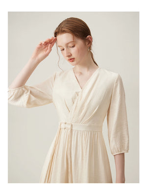 Vintage-inspired puff sleeve midi with tie waist
