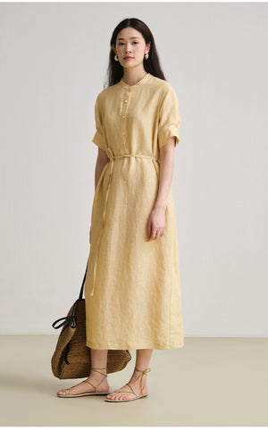 Close-up of shirt collar and button placket detail on linen dress