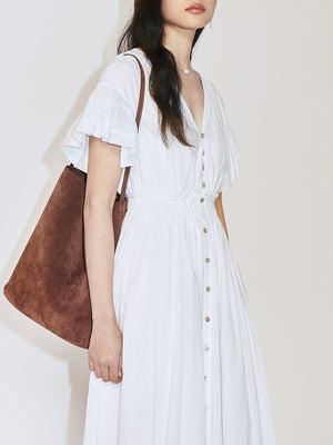 Button front and elastic waist of white maxi dress