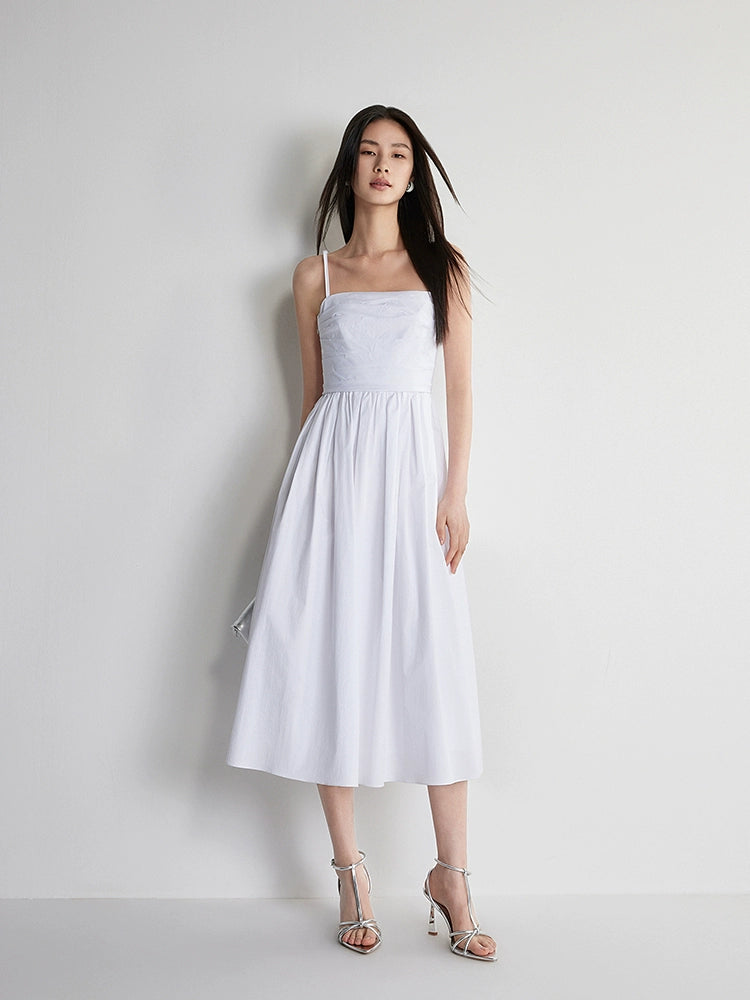 Front view of pleated white camisole midi dress