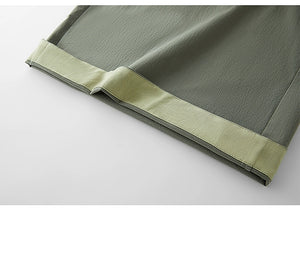 Elegant sleeveless utility jumpsuit in sage green
