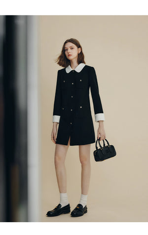 Black structured dress coat with gold button accents