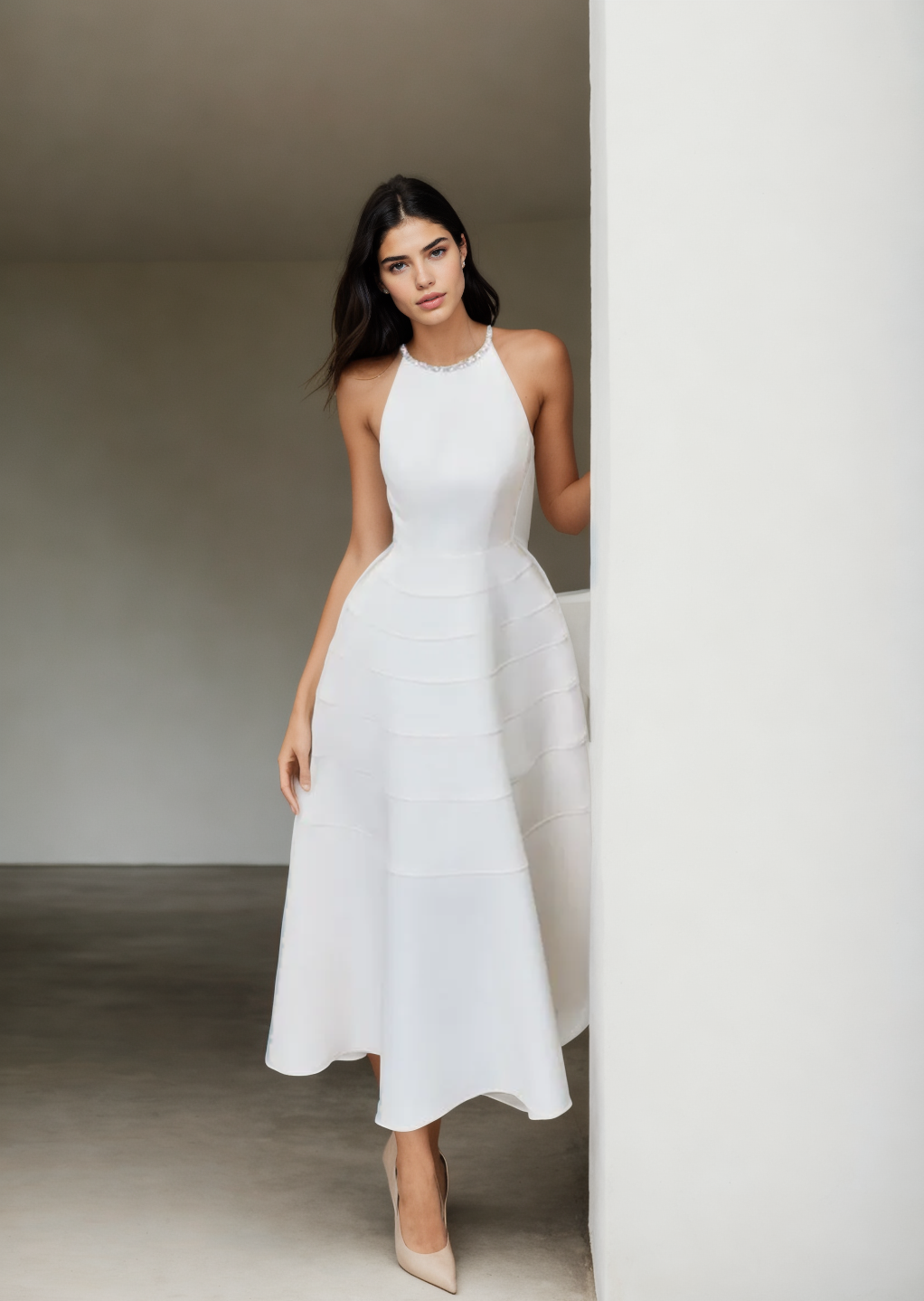 Gabriella long flared dress with a halter neckline, embellished with jewels