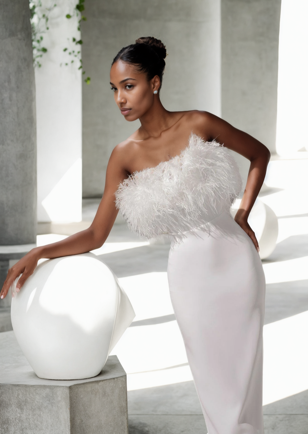 Ember dress embellished with feathers