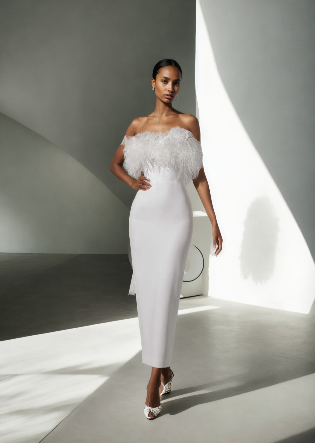 Ember dress embellished with feathers