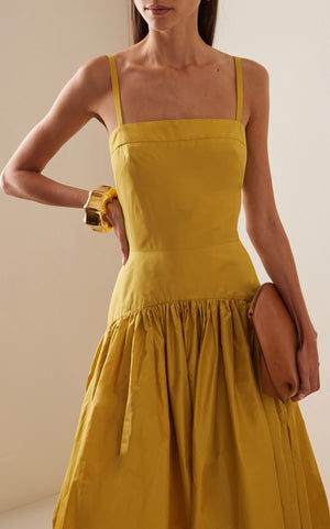 Flowing yellow summer dress made from breathable linen